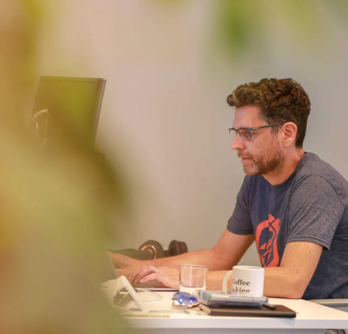 A person working at their laptop