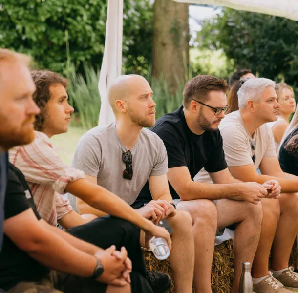 Zengenti team members sat down under a marquee